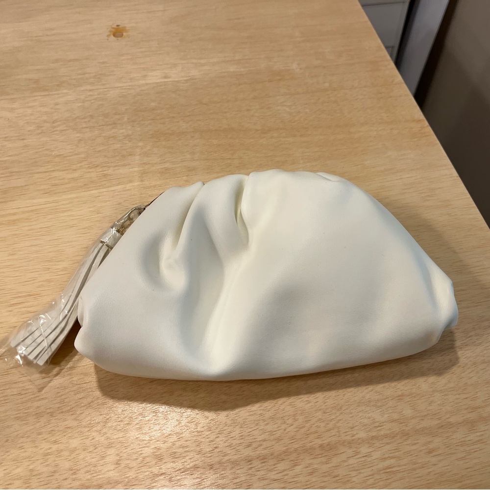 UNDERSTATED LEATHER Crescent White Clutch - Dust bag Included. NWOT